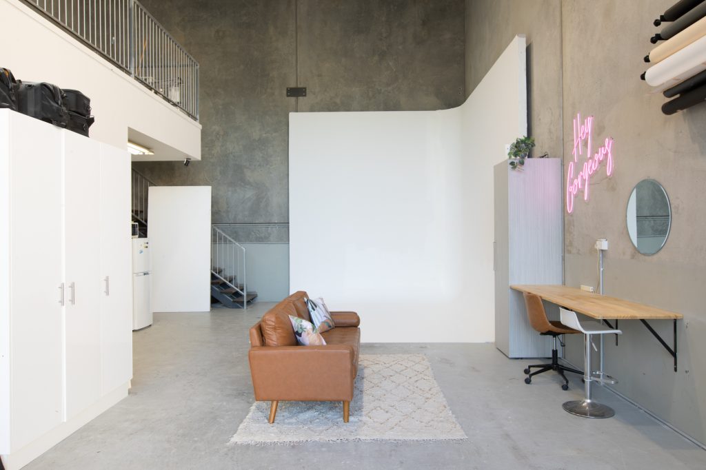 warehouse studio with white corner cyclorama