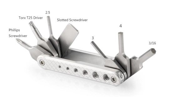 Small silver, swiss army knife style folding tool set